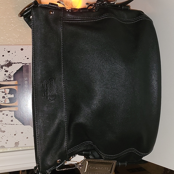 Coach Handbags - Coach black leather hobo bag with silk burgundy lining, excellent condition 👏